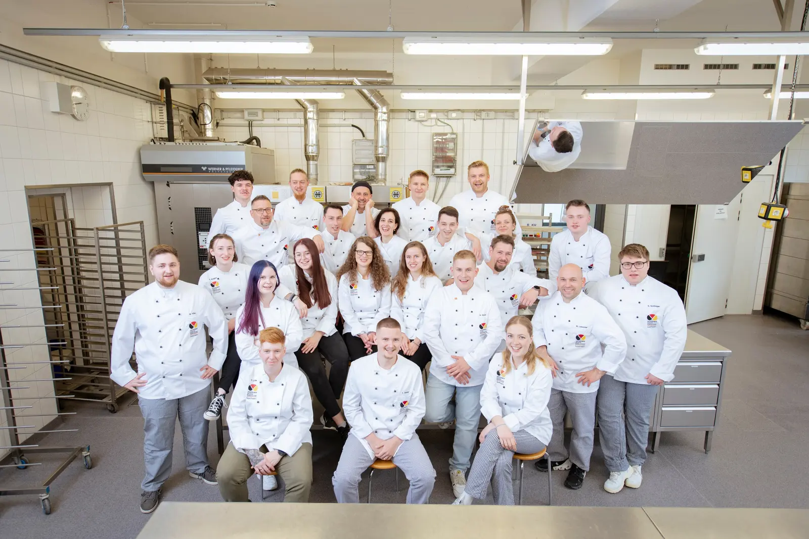 Gruppenbild des Meisterkurses in der Backstube der Akademie